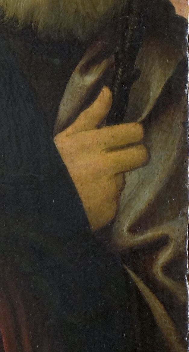 Look at Saint Joseph's staff, a sign of his authority.