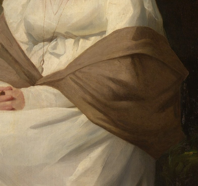 Draped elegantly, the shawl adds warmth and depth to her attire, contrasting with the white gown.
