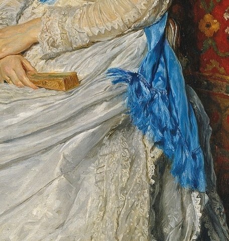 These vibrant accents provide a striking contrast to the white gown and add a touch of dynamism.