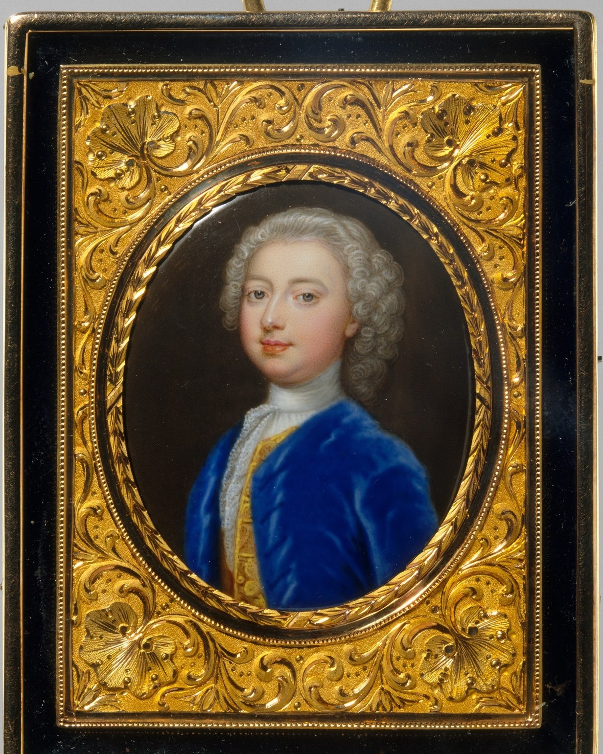 The ornate frame itself speaks of luxury and artistic skill.