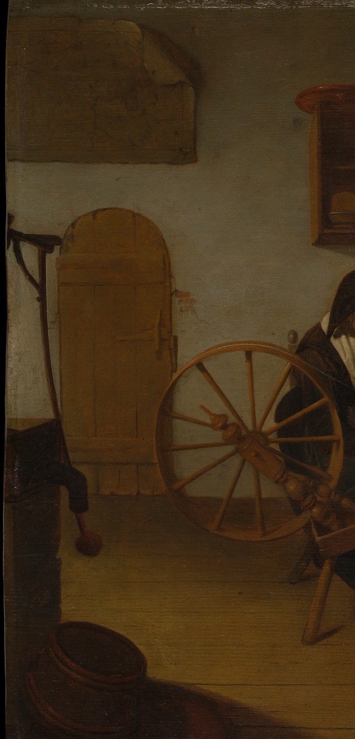 Dominates the left third with radiating spokes and rim; both the title and the painting's moral center , it makes labor visible and structural.