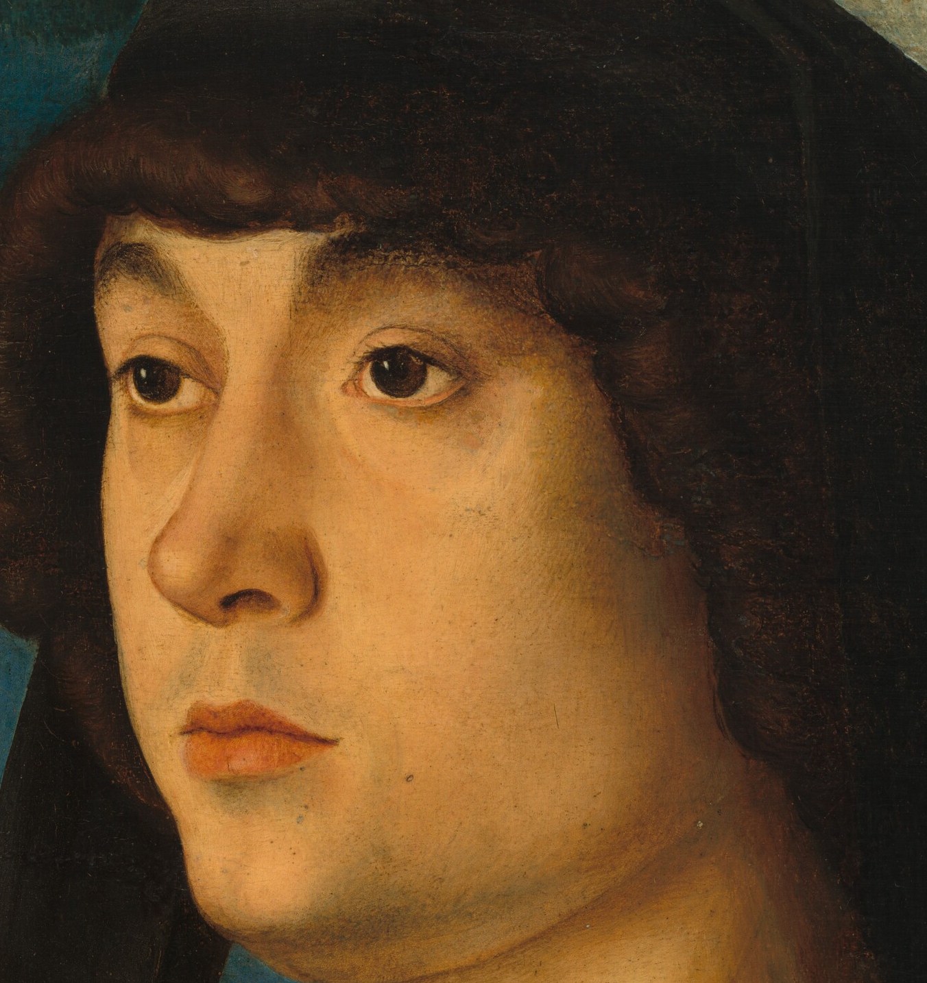 Bellini used layered oil paint, making the skin seem to breathe.