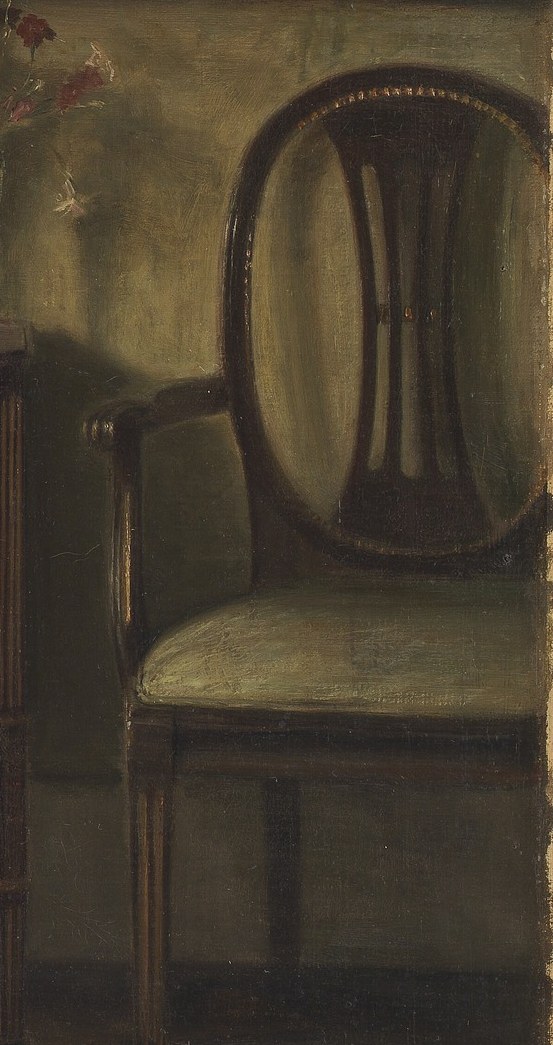 Its elegant form and soft upholstery imply comfort and a lived-in domestic space.