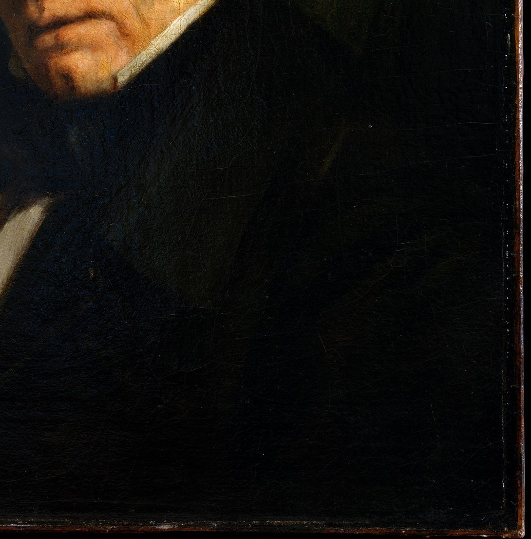 The deep shadows and subtle fabric texture give a sense of weight and presence.