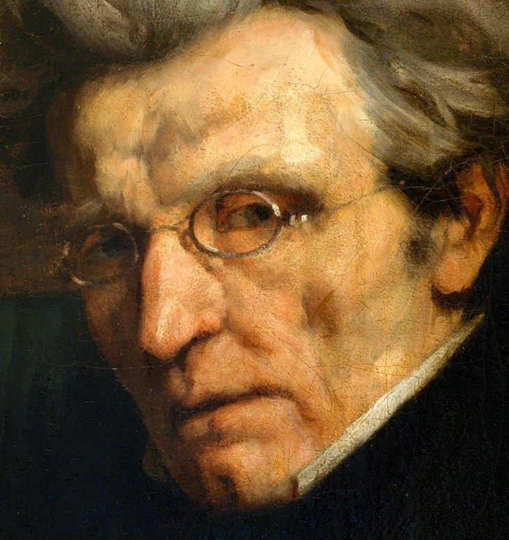 Look at his deeply lined, weathered face.