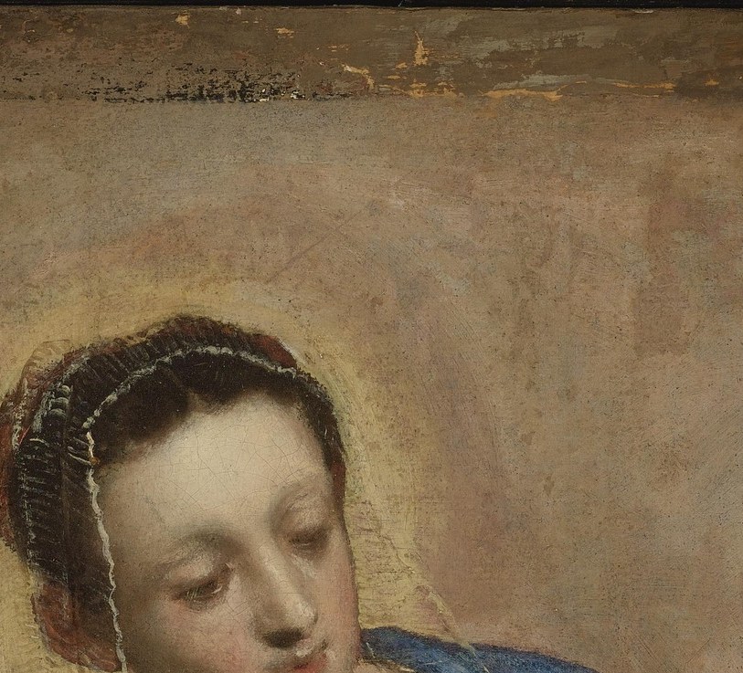 She looks like any young mother, lost in a quiet moment.