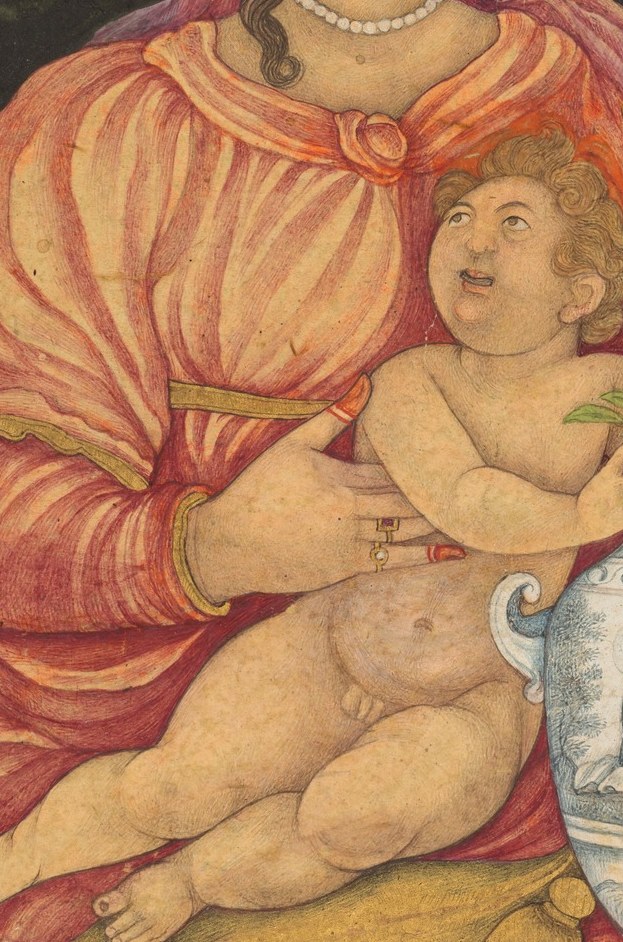 Mary cradles a surprisingly active infant.