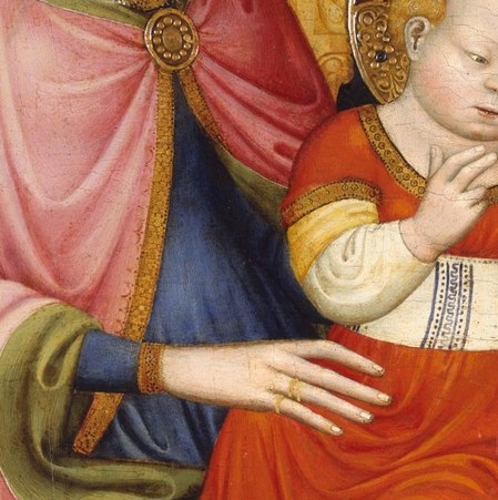 The Christ Child’s hand gestures towards the donor, and to us.