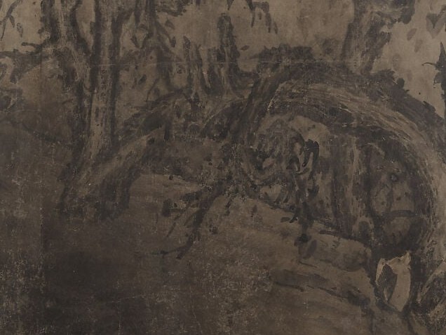 The swirling ink strokes create a dynamic and powerful depiction of the dragon's form.