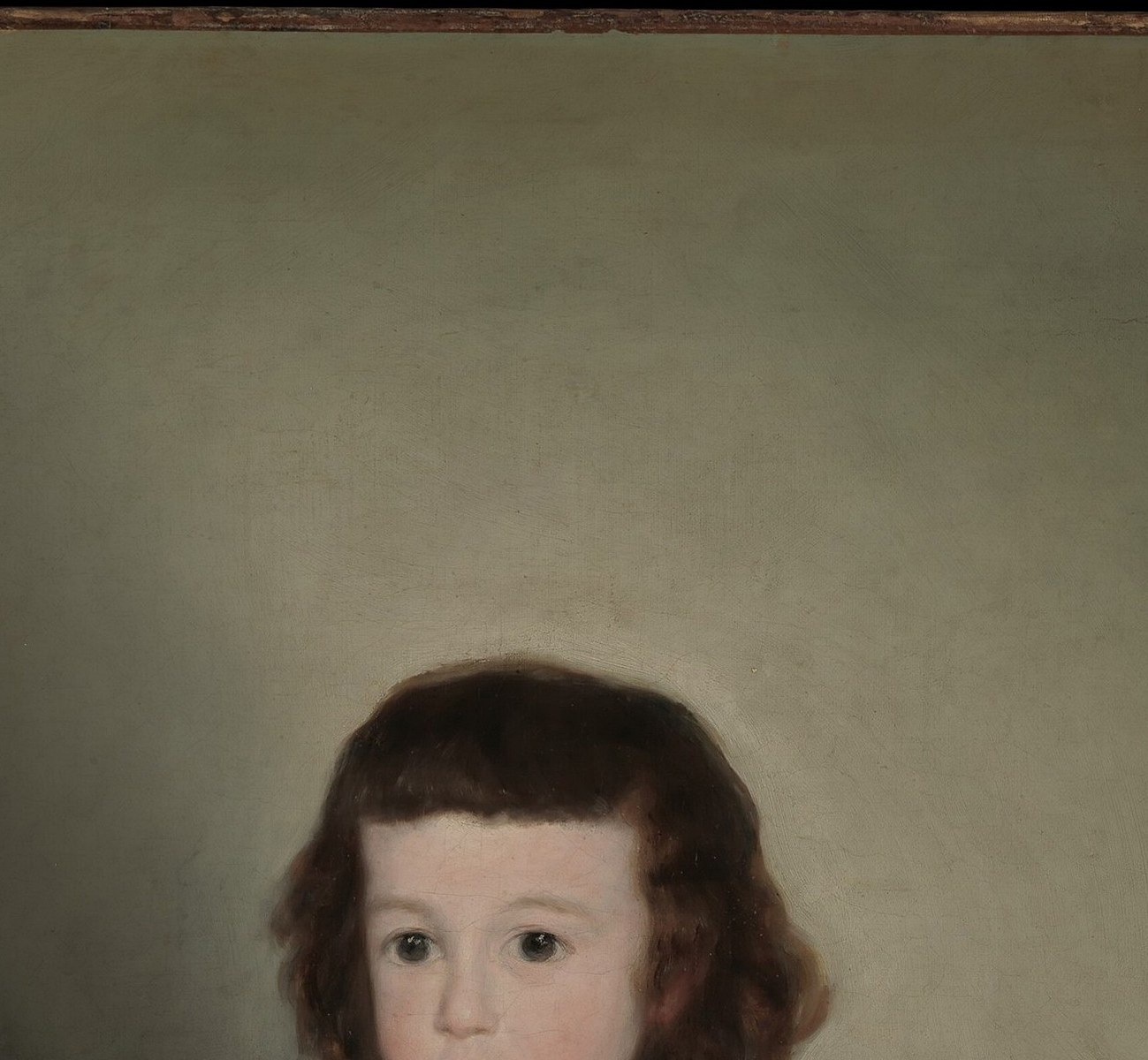 Goya renders a child's face with adult psychological weight , the wide dark eyes hold the viewer unsettlingly, neither innocent nor knowing