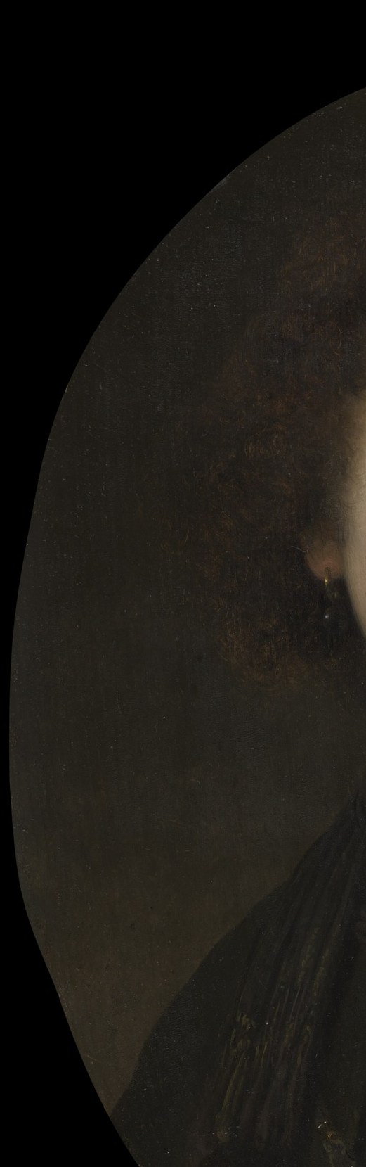 Flat, deliberate emptiness , Rembrandt learned from Caravaggio that nothing focuses attention like eliminating it; the darkness is an active compositional choice.