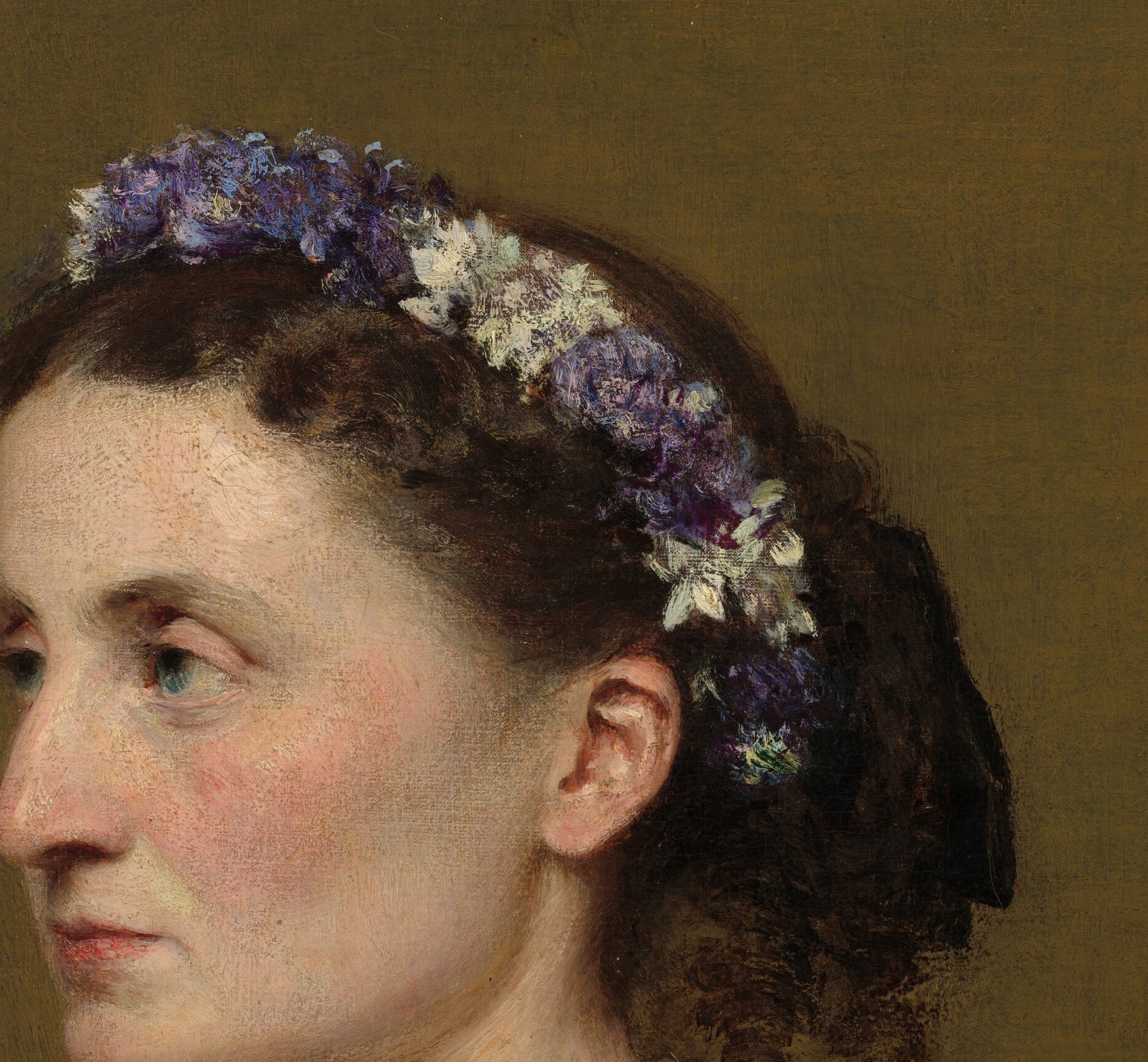 Her face is a study in aristocratic stillness.