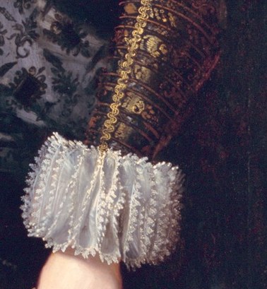 The relaxed pose of her hand suggests comfort and familiarity with her surroundings.