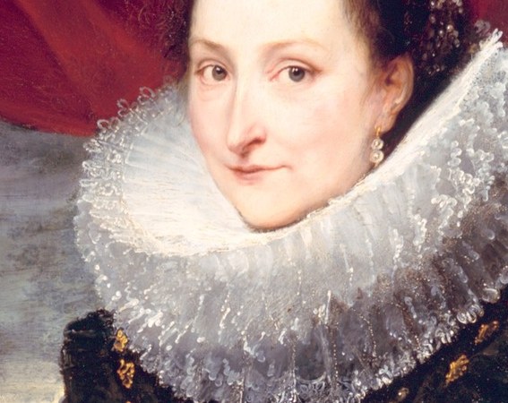 Her elaborate ruffled collar was a peak fashion statement.