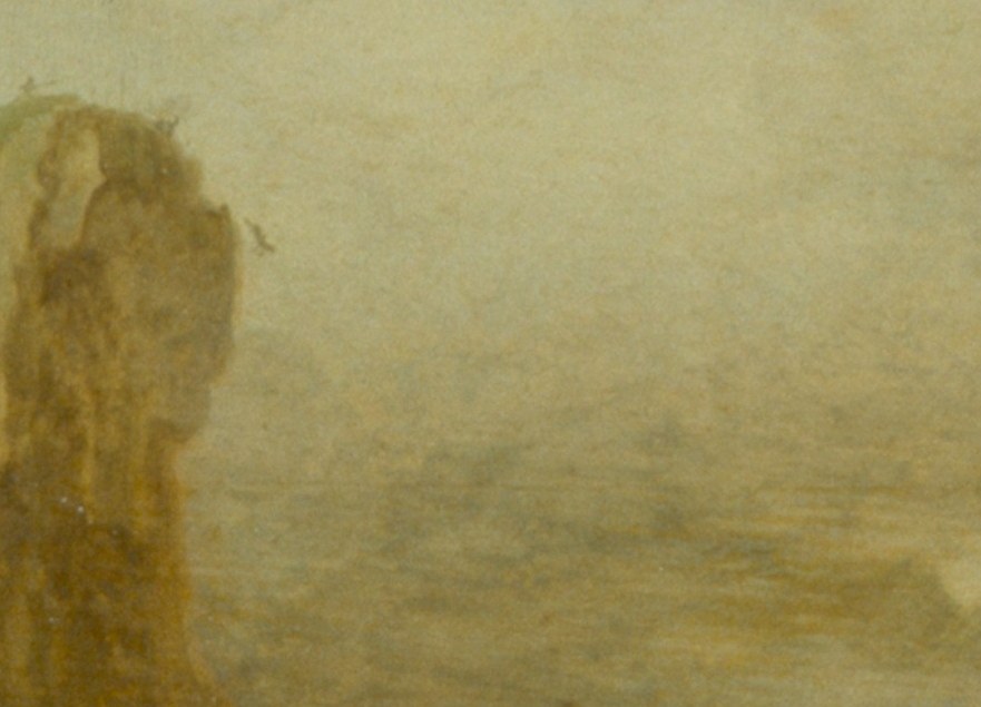 The distant cliffs show the vastness of nature.
