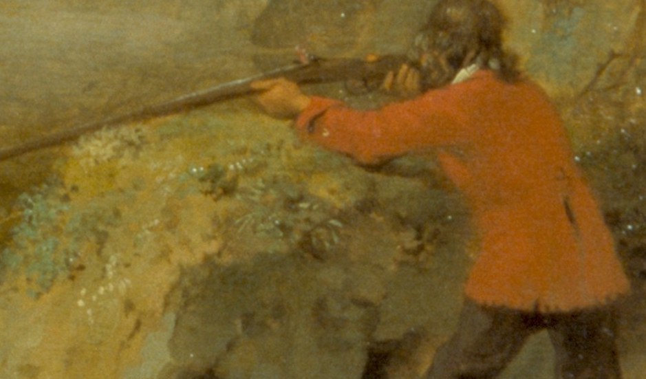 His bright orange shirt highlights his human presence.