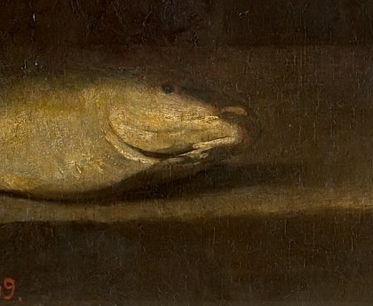 A fish on the table references his former life.