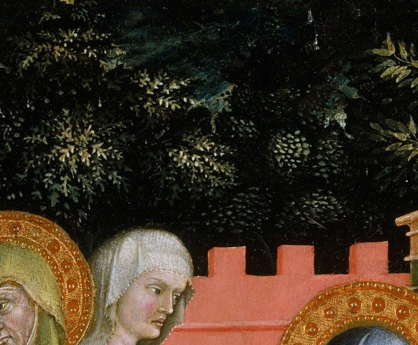Its warm gold pops against the red crenellated backdrop; the clean circle identifies the period's raised-gesso gilding technique, visible as a faint rim ridge in good reproductions.