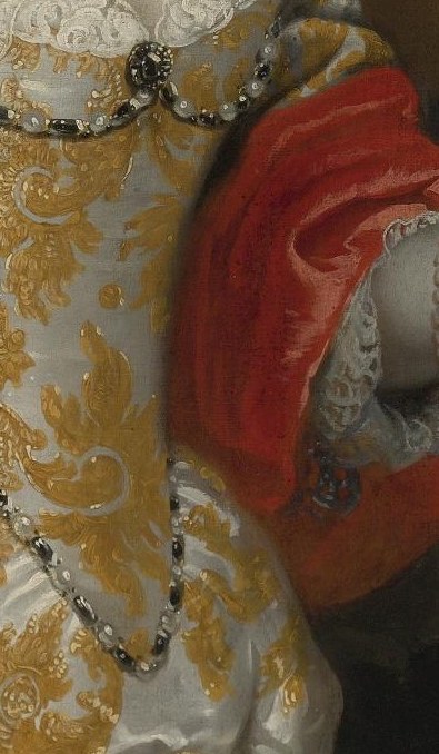 The feather she holds was a symbol of wit, and perhaps of vanitas.