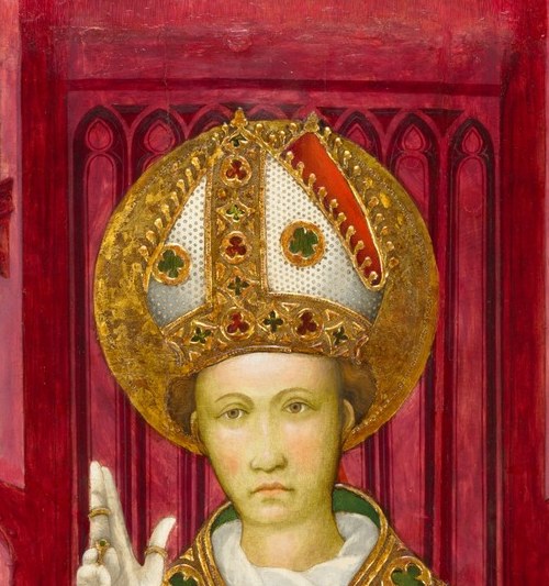 His golden mitre signals his high rank in the church.