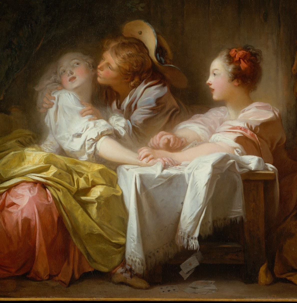 Fragonard's pyrotechnic signature: the yellow catches the light source like a lantern and draws the eye before any face does , the dominant compositional event.