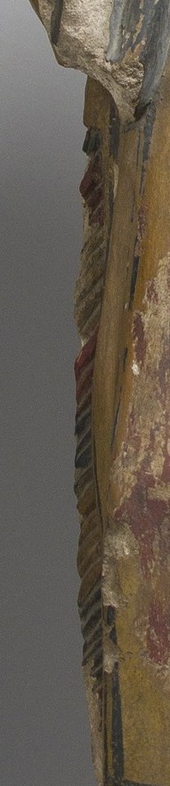 The textured edges suggest it was once carved stone.