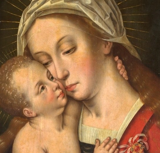 A quiet moment of deep maternal love.