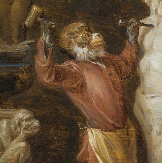Here, a monkey mimics a sculptor at work.