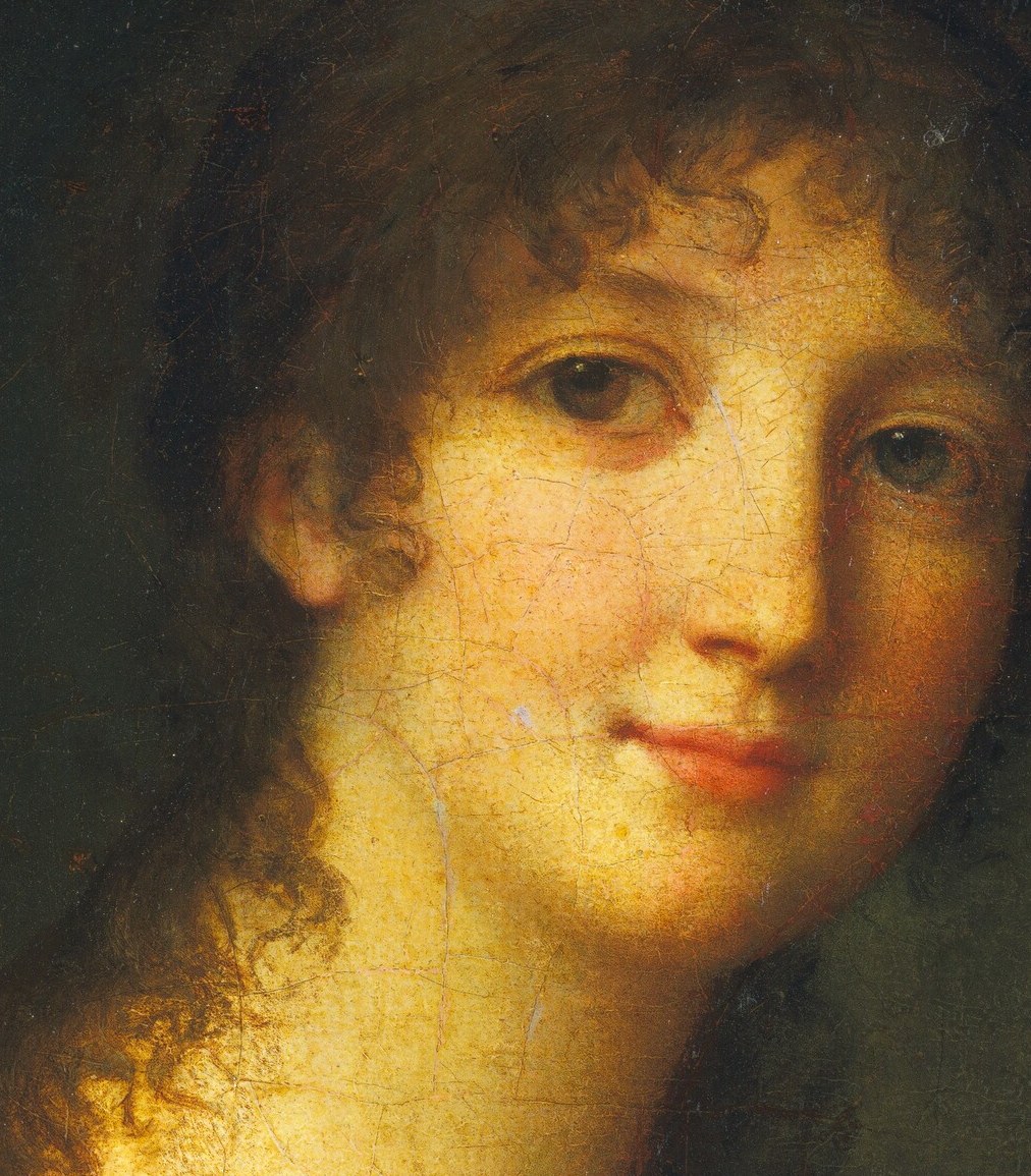 She seems to gaze at us from another time.