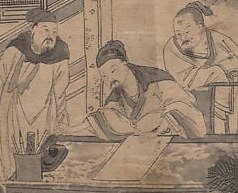 One figure focuses intently on a scroll.