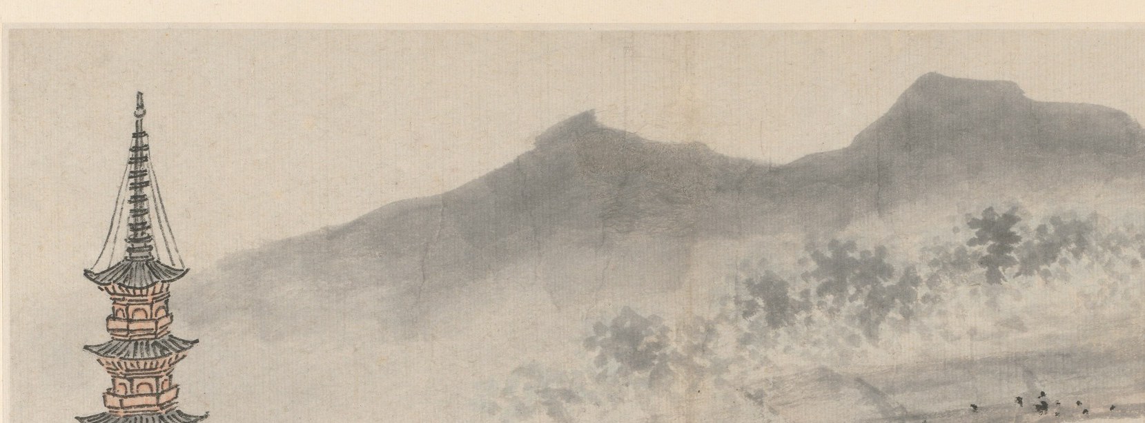 While distant mountains dissolve into pale washes.