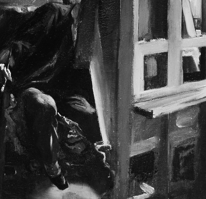 Here, two figures are caught in a private studio space.