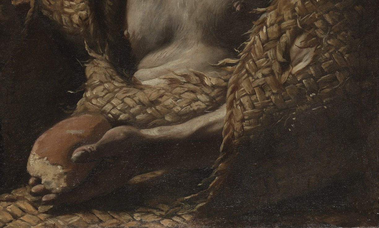 The rough staff and mat emphasize his ascetic, solitary life.
