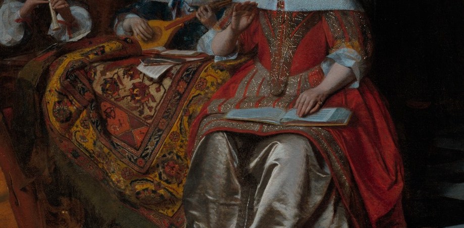 Look at the ornate carpet on the table.