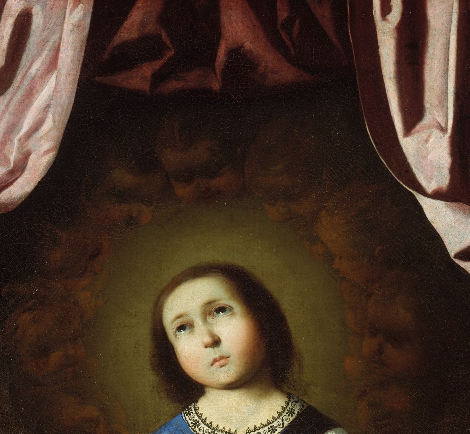 Zurbarán renders the divine light as a warm atmospheric bloom rather than a gold disc , a naturalistic Baroque solution to a supernatural convention