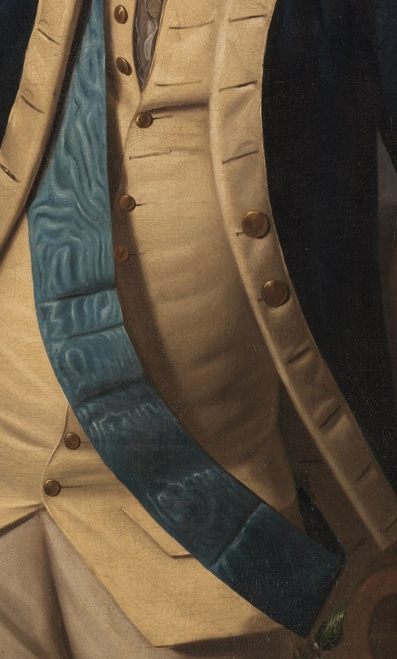 His blue sash signifies his importance and military rank.