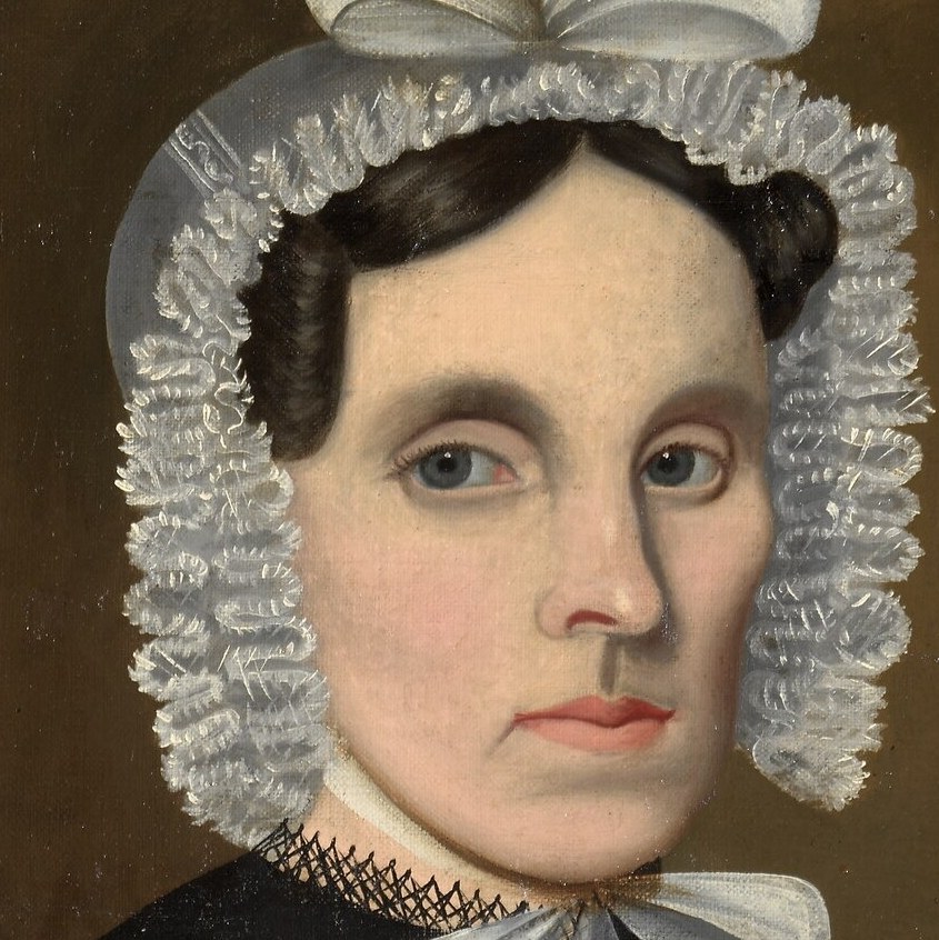 The delicate lace of the bonnet suggests refinement and social standing.