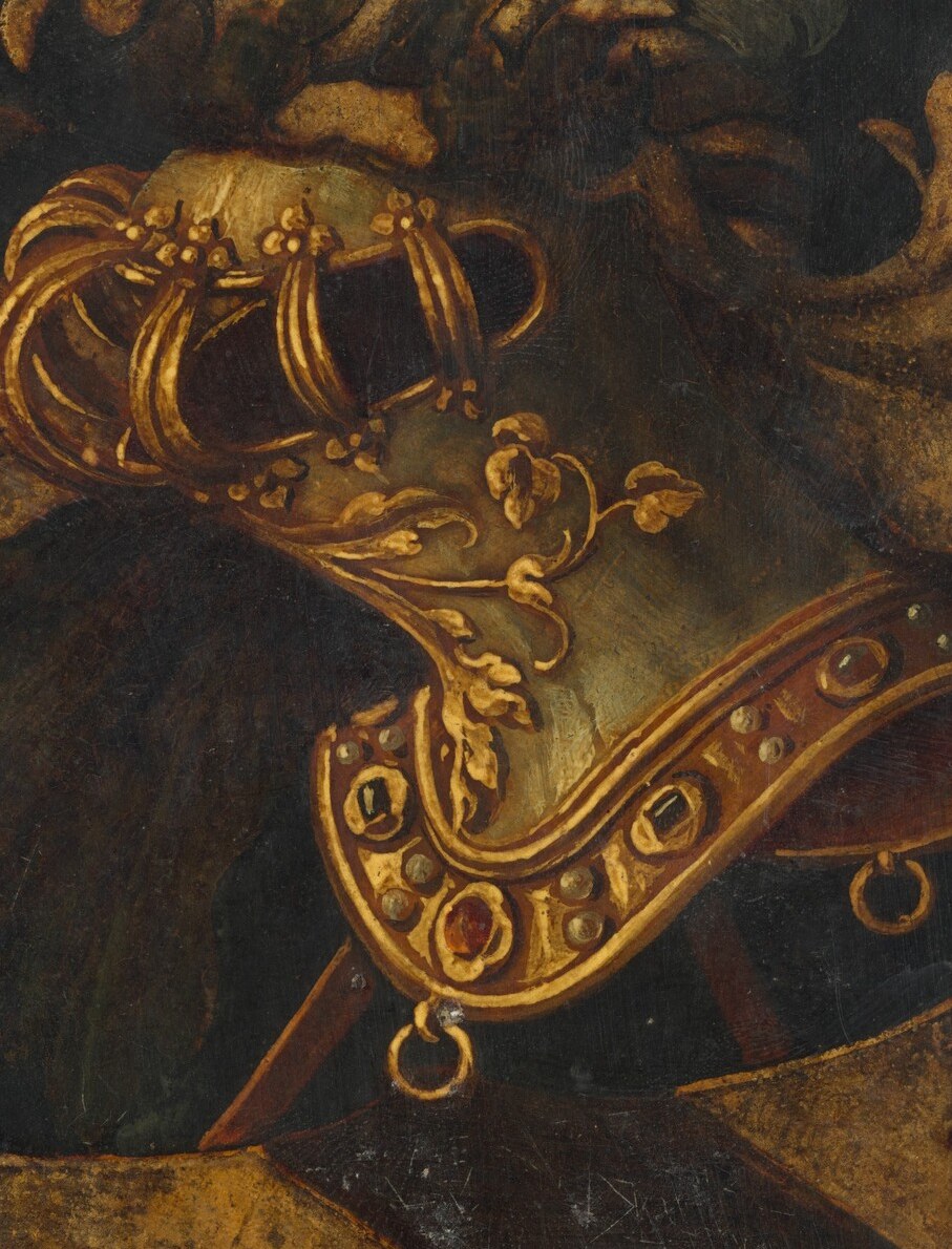 The detailed, gilded helmet signifies nobility and rank, serving as a key heraldic element.