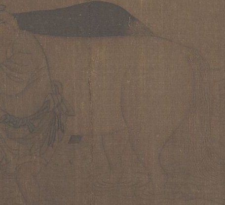 A man kneels by a river, diligently scrubbing a horse.
