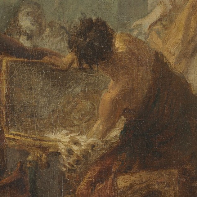 His intense focus and physical action convey the urgency of Laban's search.