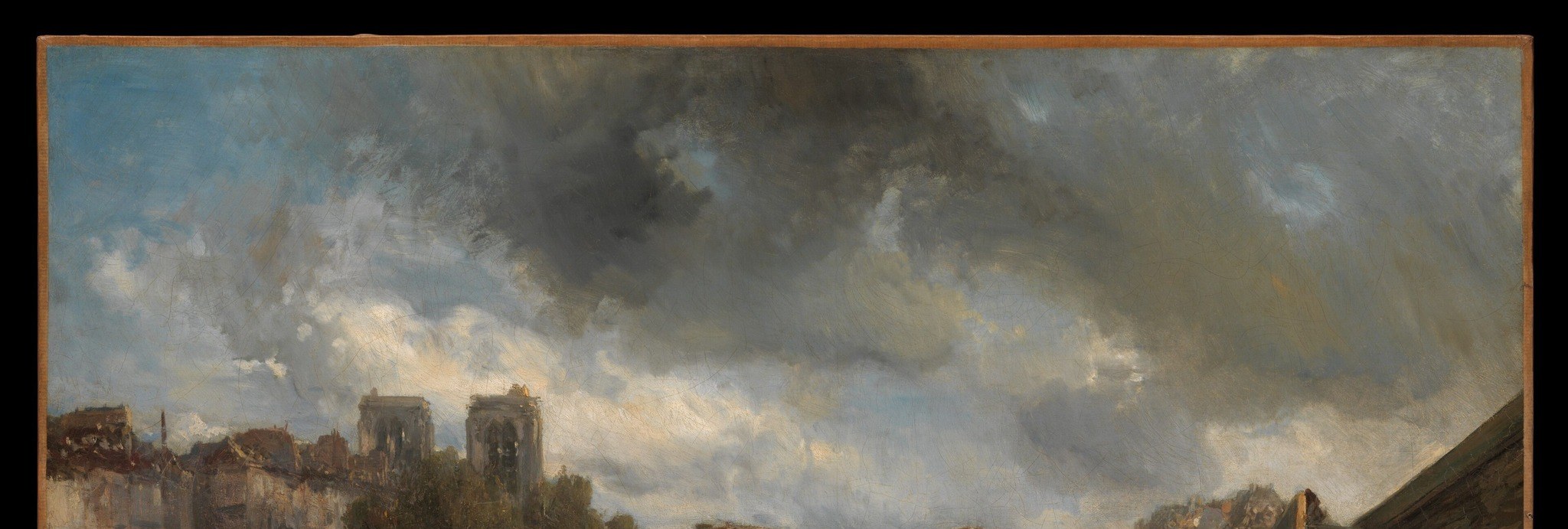 The turbulent sky with shifting light and shadow creates a powerful atmosphere and mood.