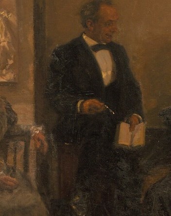 A man presents his thoughts, paper in hand.