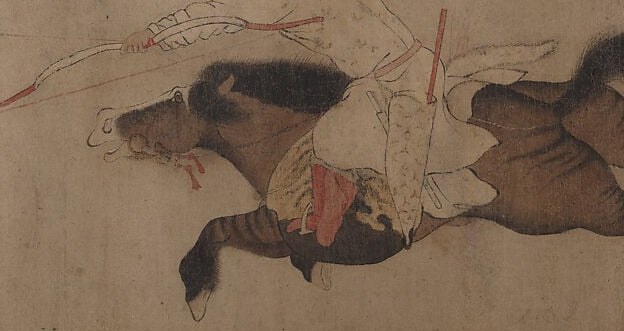 Below him, all four legs leave the ground.