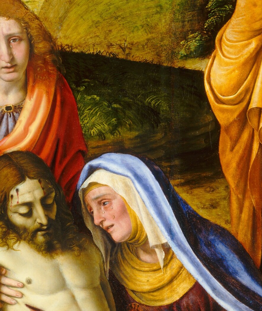 A mother holds her son one last time.