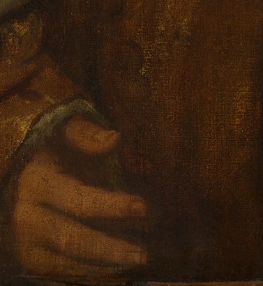 His left hand rests with calm authority.