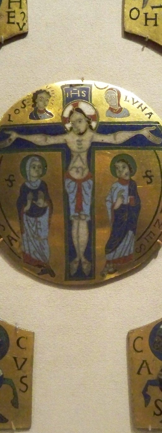 The vertical axis of the entire composition , stiff Romanesque frontality converts suffering into timeless icon rather than moment