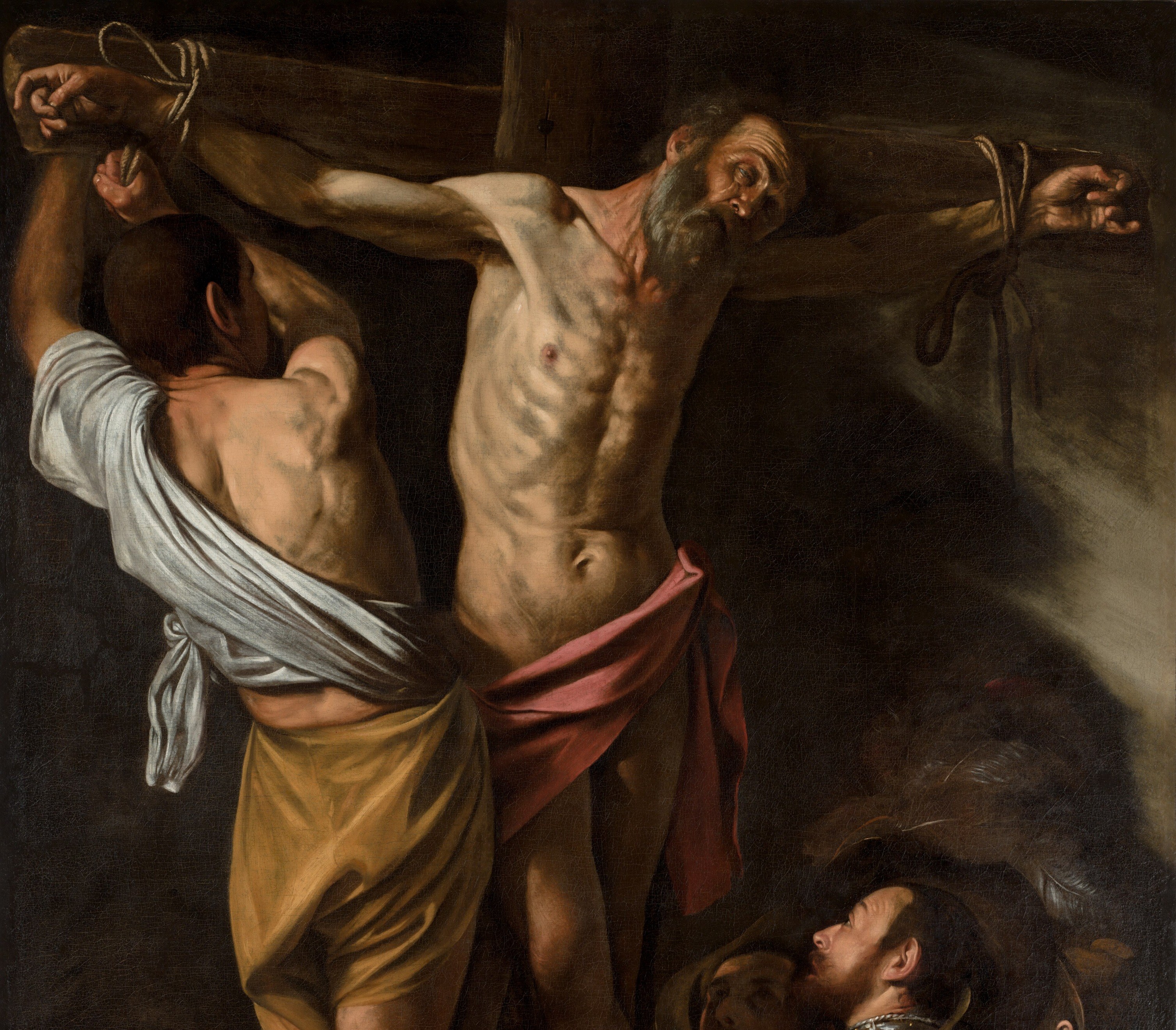 The darkness is not empty space but an active presence , Caravaggio eliminates setting entirely so the viewer has nowhere to retreat; the confrontation with martyrdom is inescapable.