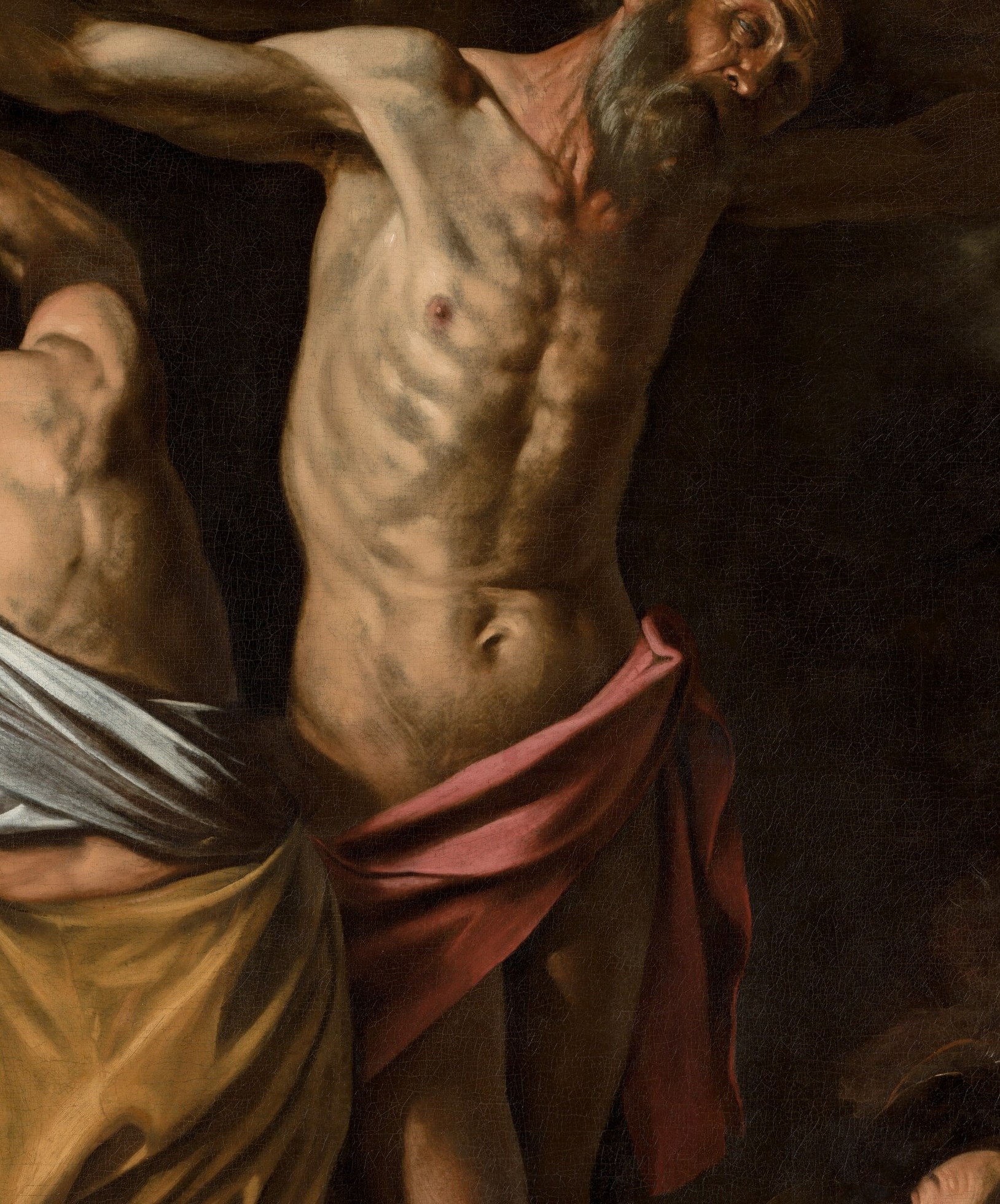 Caravaggio's chiaroscuro at full force: flesh radiates against absolute black with no middle ground, making the body simultaneously sacred and brutally mortal , the technique itself is the argument.