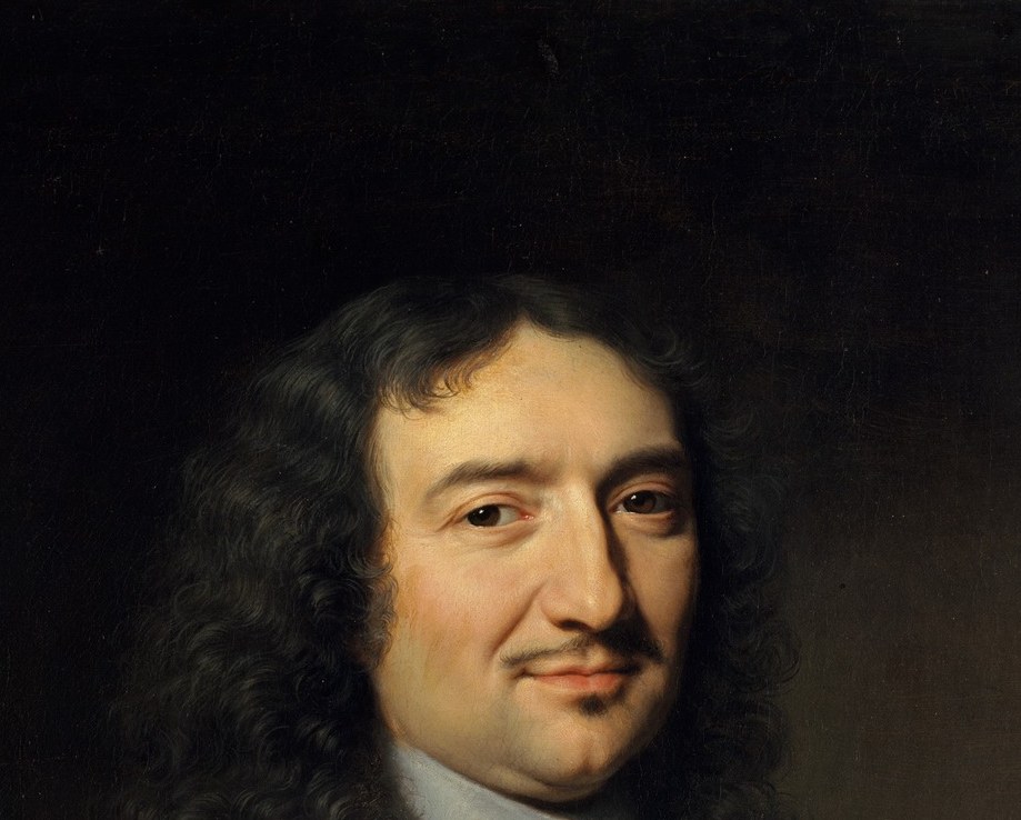 He wears his own hair, not a wig, a decade before Versailles made wigs mandatory.