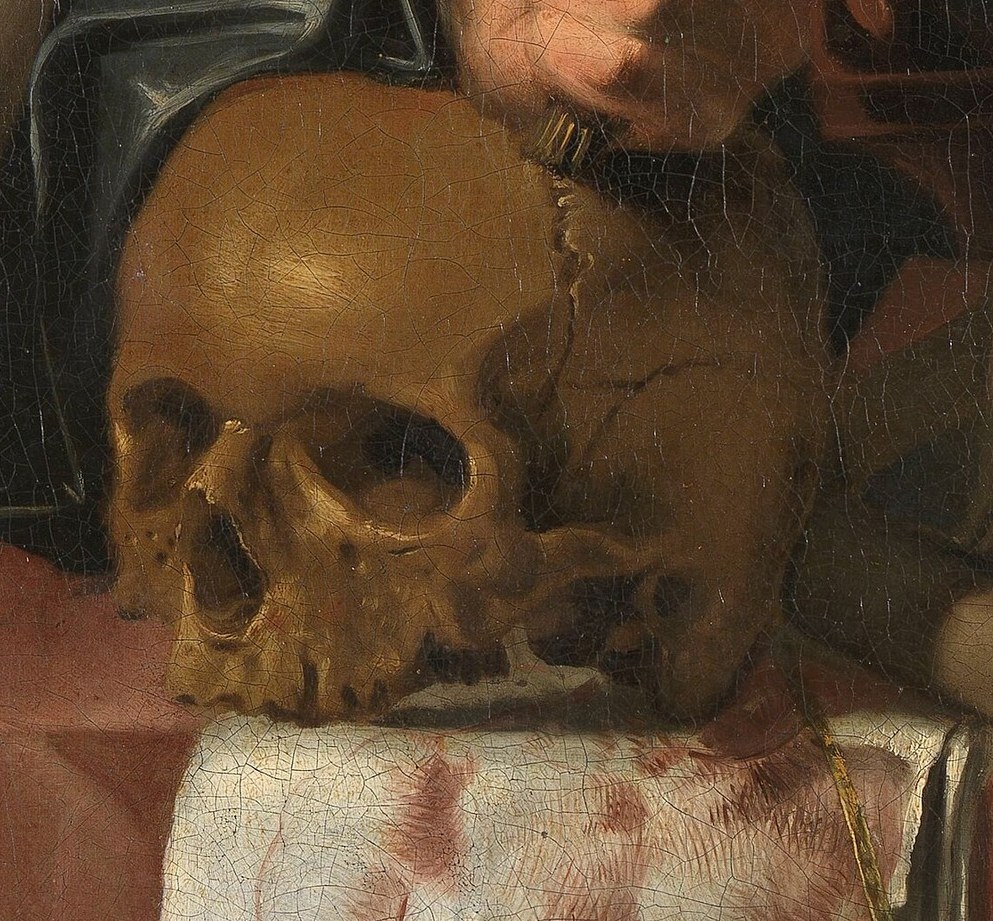 A skull, a classic symbol, reminds us of mortality.
